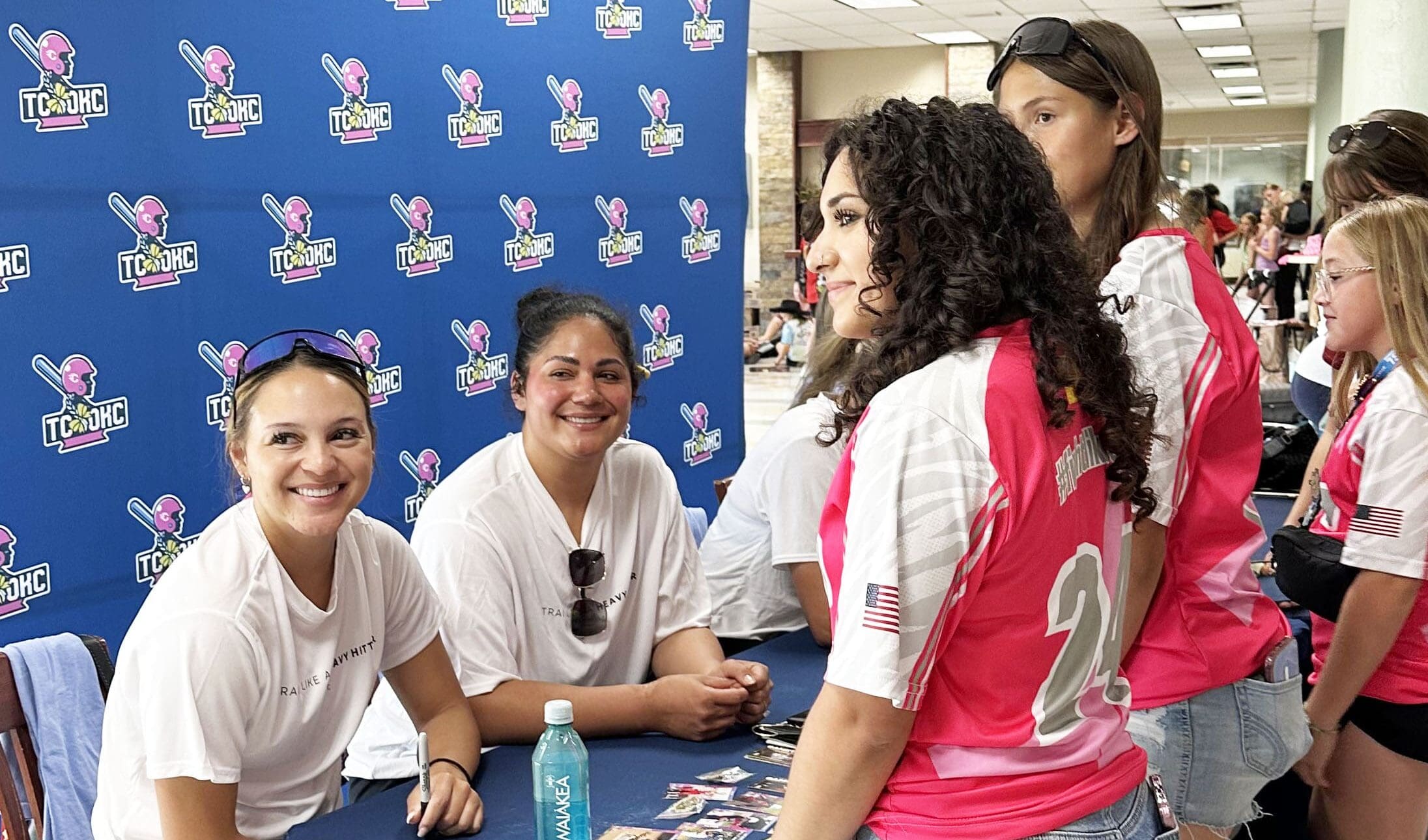 Young athletes meet and collect autographs from softball stars during the TC OKC Player Party experience.