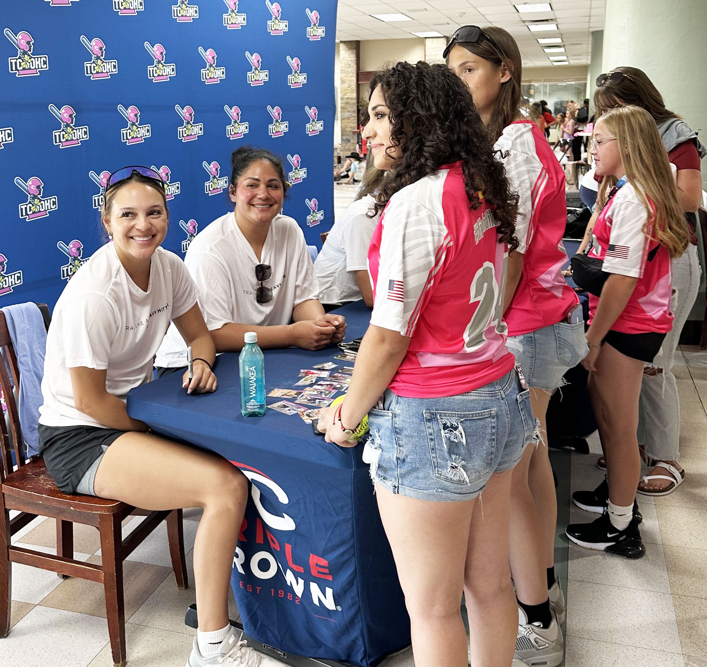 Young athletes meet and collect autographs from softball stars during the TC OKC Player Party experience.