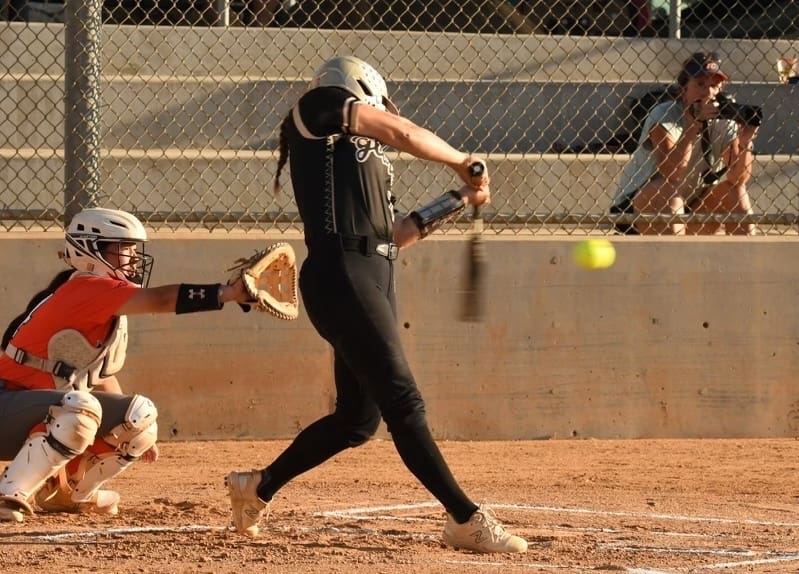Abby Lynch-Buxton connects for a home run during a game