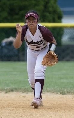 Gabby Bonilla prepares to field a ground ball during infield play. Bonilla is known for her quick reflexes and vocal leadership in the middle infield.
