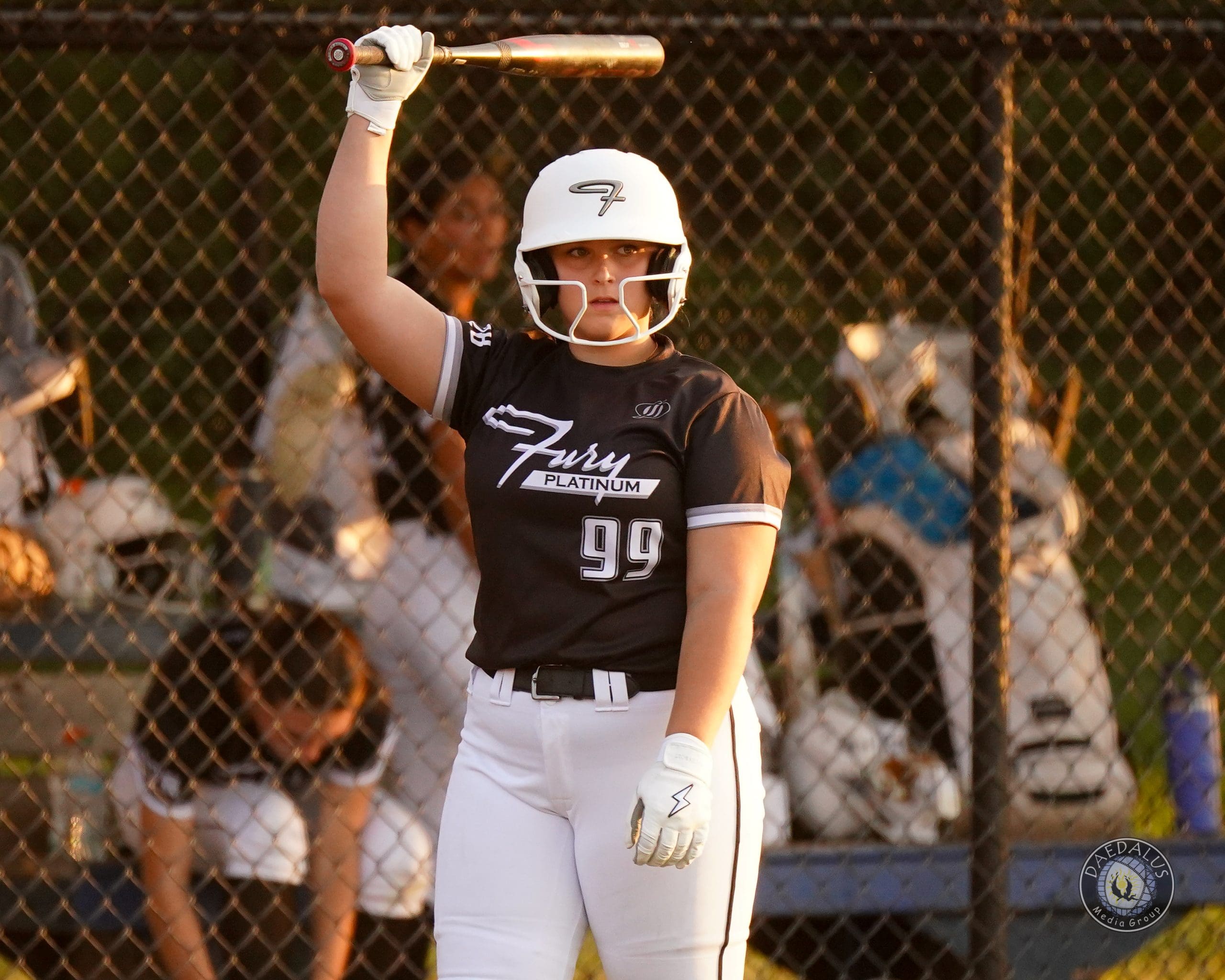 Olivia Clark locks in her routine as she steps into the batter’s box for New England Fury Platinum-Peyton. Clark uses visual cues and rhythm to stay focused during high-pressure moments. Photo by Daedalus Media Group
