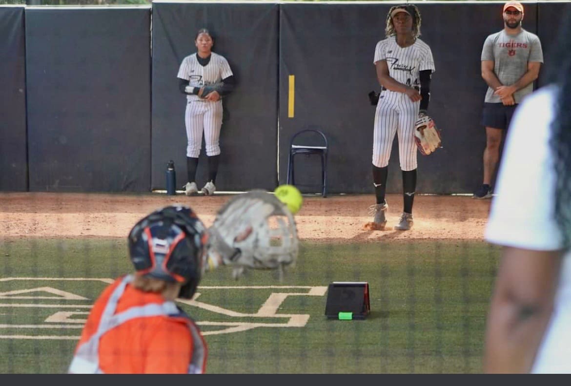 La’Breah Sands delivers a pitch while warming up before a game.