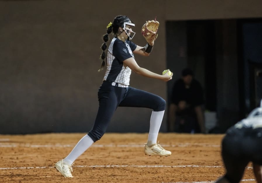 Gabi Winters delivers a pitch during a Mariner High School softball game in Cape Coral, Fla.