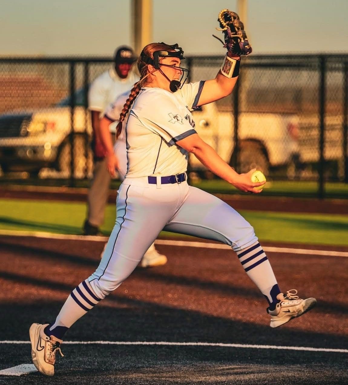 Thrall’s Miley Pokorny fires a pitch during a sunset matchup in the 2025 postseason. Pokorny helped lead the Tigerettes with a .145 opponent ERA.